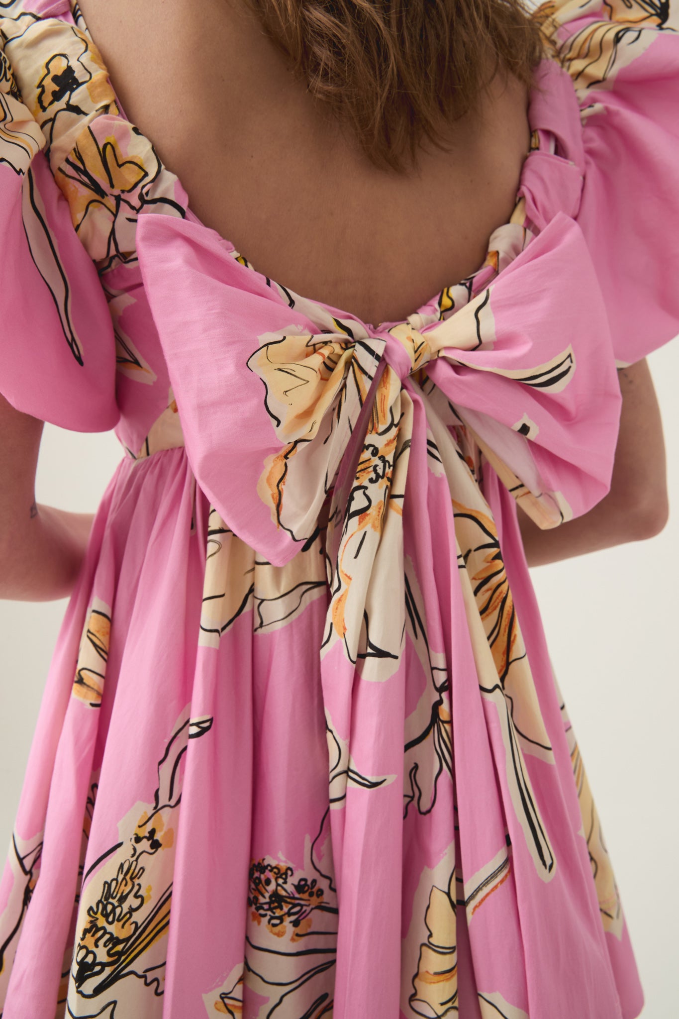 Gretta Bow Back Mini Dress | Pink Hibiscus | Aje Aje NZ Gretta Bow Back Mini Dress | Pink Hibiscus | Aje Aje NZ