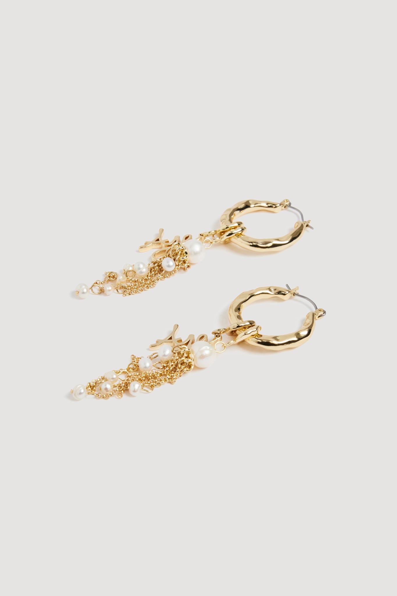 26RE9530_GLD-PRL_2_1758721501