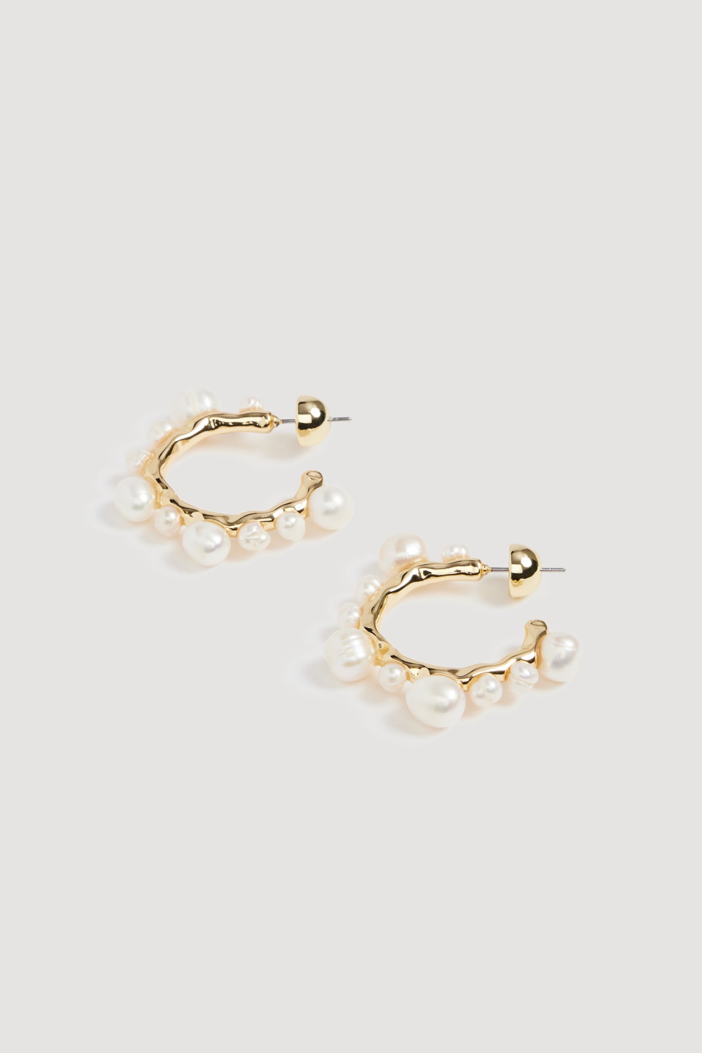 26RE9542_GLD-PRL_3_1758721658