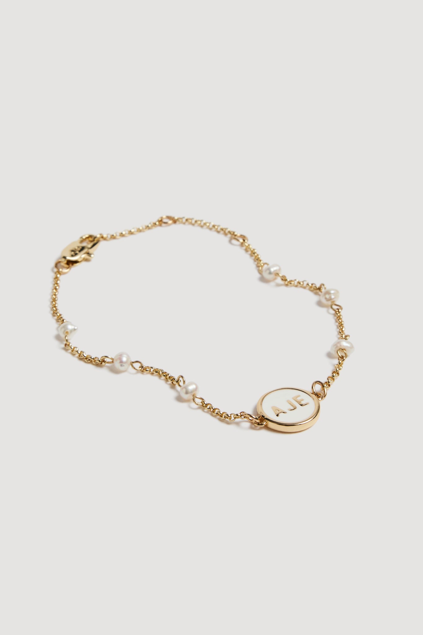 26RE9549_GLD-WHT_3_1759118038