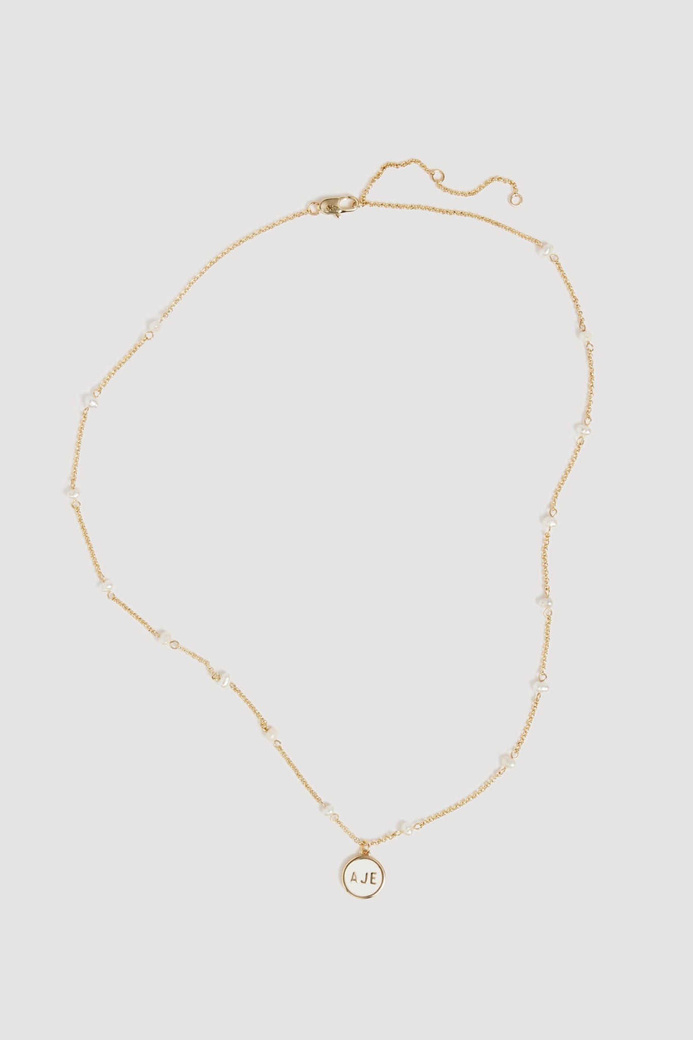 26RE9550_GLD-WHT_2_1758721746