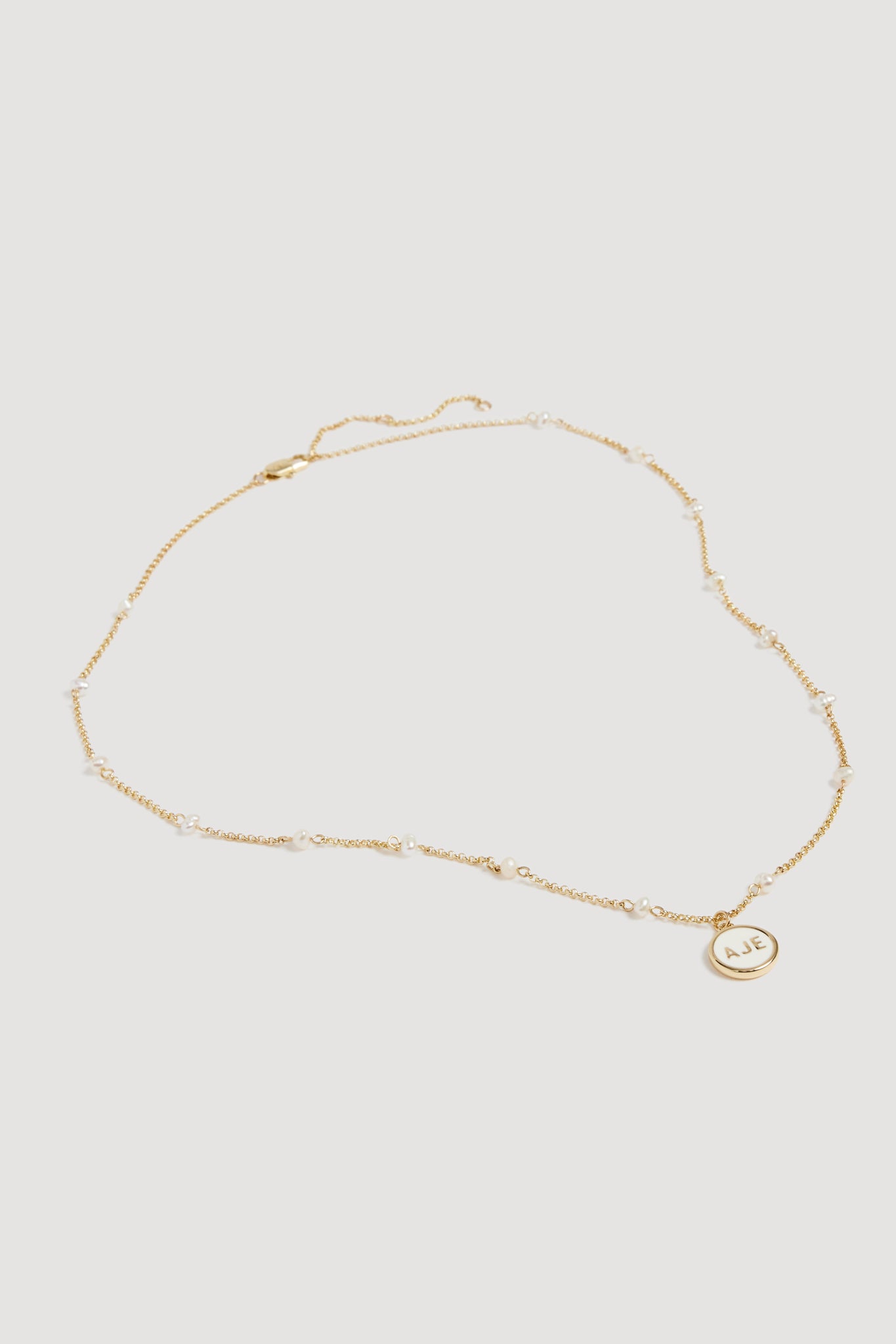 26RE9550_GLD-WHT_3_1758721720