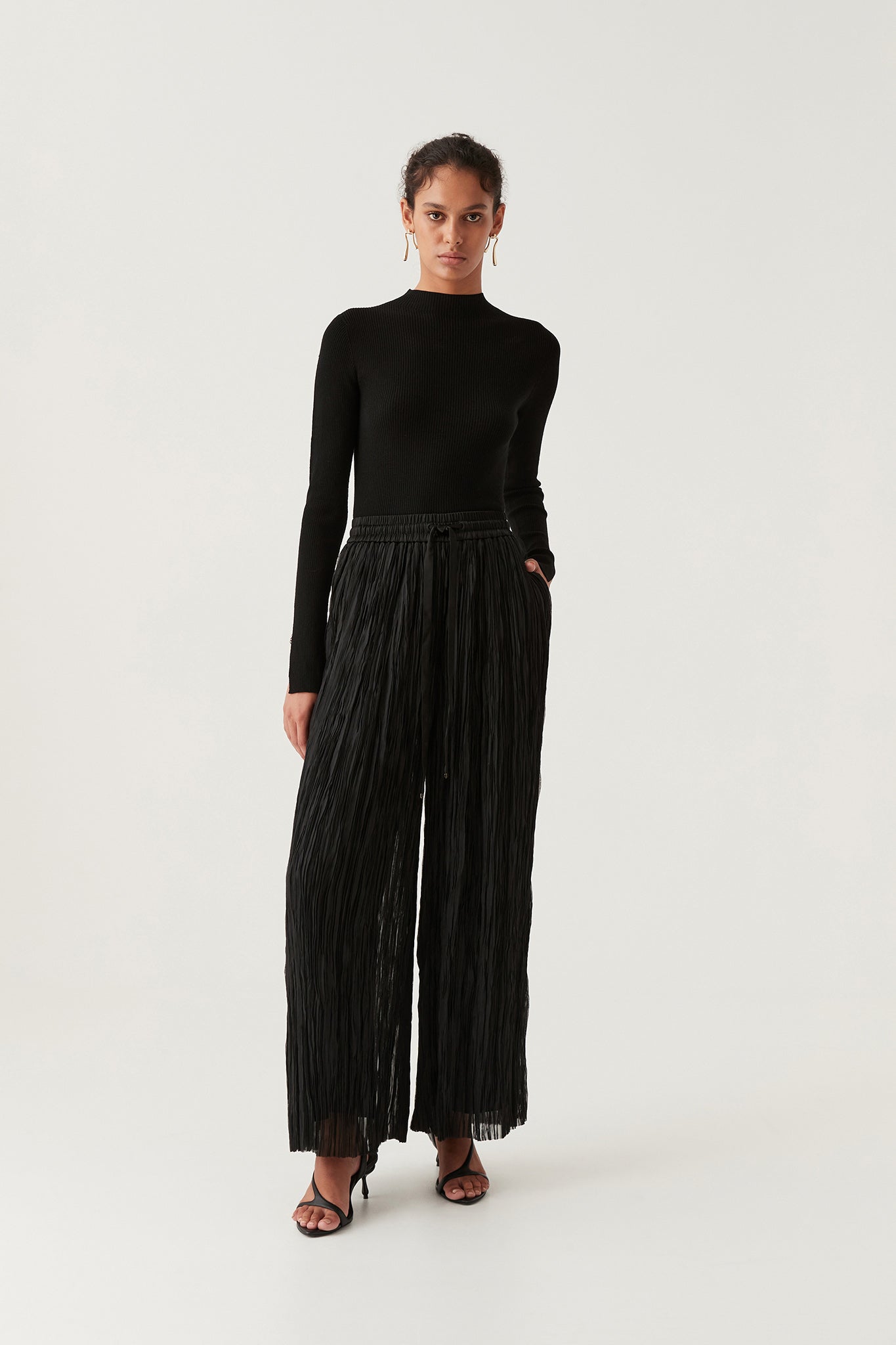 pleated/gathered Palazzo trouser with elastic waist band.